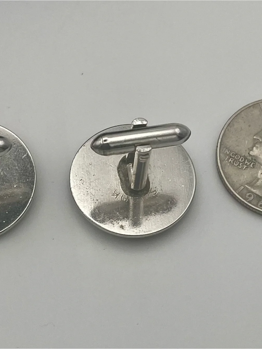 Silver Round Cufflinks with Triangle Emblem Inlaid with Crystal Detail